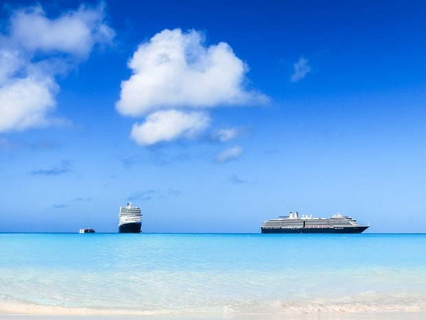 Blue,Sea,,Sand,,Sky,And,Cruise,Ships